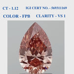 Pear shaped brownish pink solitaire diamond
